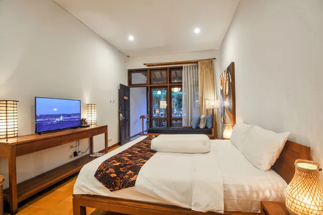 غرفة ديلوكس بسرير كينج، Rumah Mertua Heritage Yogyakarta 2/7