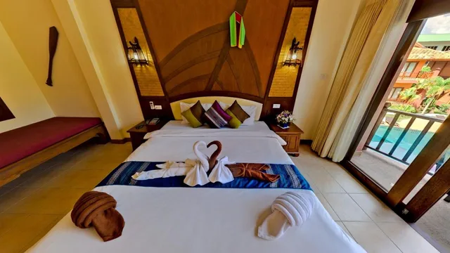 غرفة ديلوكس بسرير مزدوج أو سريرين منفصلين بإطلالة على المسبح بشرفة، Andamanee Boutique Resort Aonang Krabi 2/9