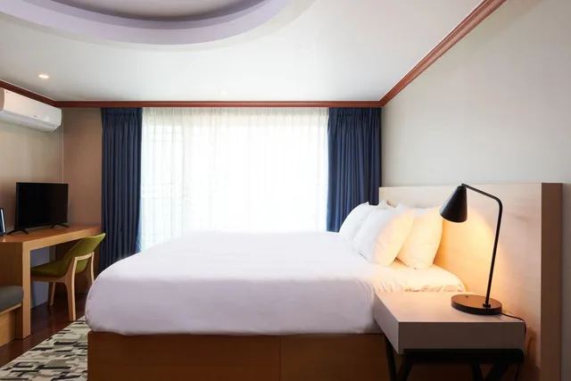 غرفة ديلوكس بسرير كينج بغرفة نوم واحدة بإطلالة جزئية على البحر، Good Morning Hotel and Resort 1/1