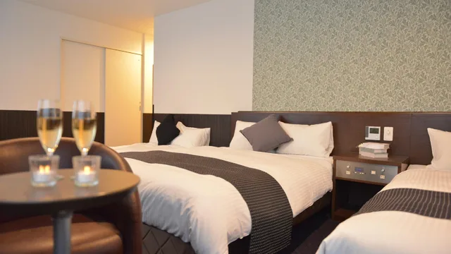 غرفة قياسية ثلاثية بسريرين مزدوجين مع أريكة، Hotel New Gaea Domemae 3/3