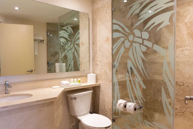 غرفة بريميوم بسريرين مزدوجين بإطلالة جزئية على البحر، The Reef Coco Beach Resort & Spa – Optional All Inclusive 5/5