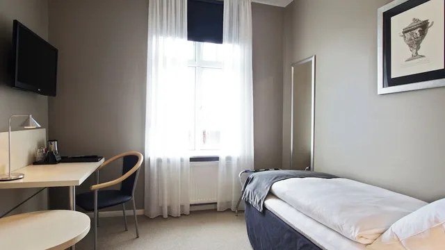 غرفة ديلوكس مفردة بسرير فردي، Hotel Kronjylland 1/3