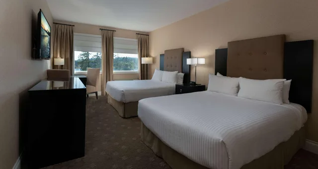 Room, 2 Queen Beds, Partial Water View، Prestige Oceanfront Resort, WorldHotels Luxury 1/2