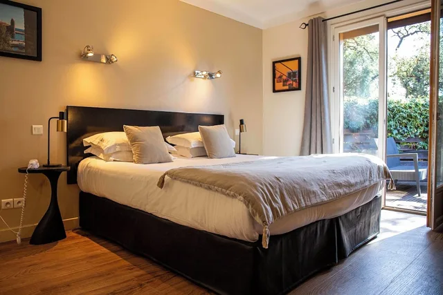 غرفة كبيرة بسرير كوين وأسرّة بطابقين بشرفة، Hotel Madeloc 8/10