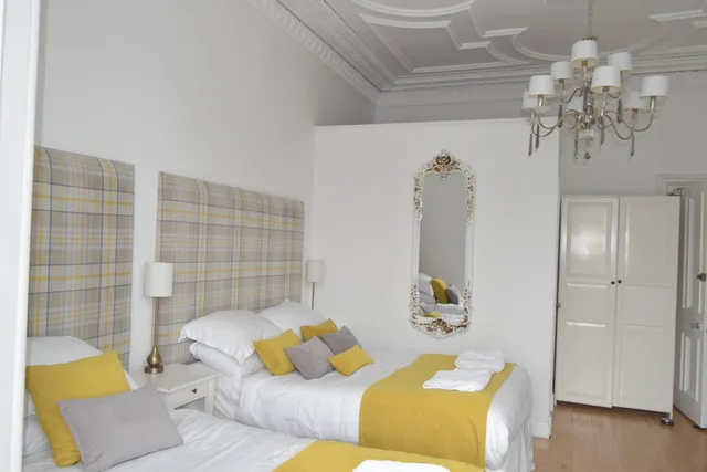 Deluxe, Quadruple, 1 Single and 2 Double Beds، The International Guest House 3/10