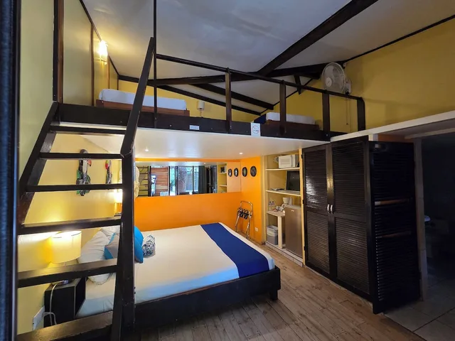 غرفة رباعية بسرير كينج وسريرين منفصلين بإطلالة على الحديقة، Hotel La Palapa 4/7