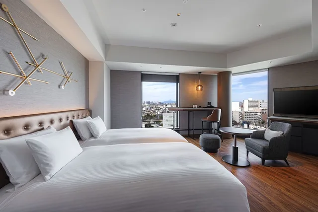 غرفة ديلوكس بسريرين منفصلين بإطلالة على النهر، Hotel Metropolitan Tokyo Haneda 1/2