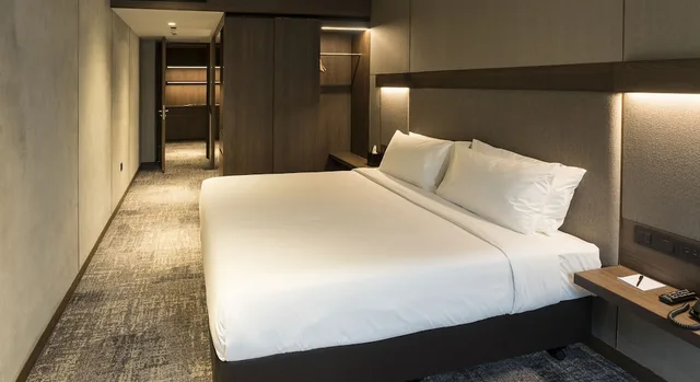 جناح جونيور بسرير كينج مع أريكة، Oakwood Bencoolen Singapore 2/7