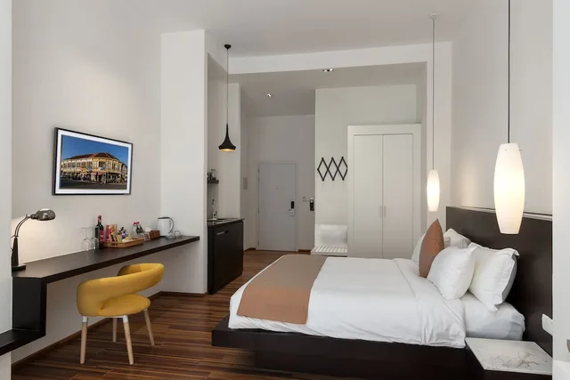 استوديو ديلوكس بسرير كينج مع أريكة، Tao Riverside Residence 1/4