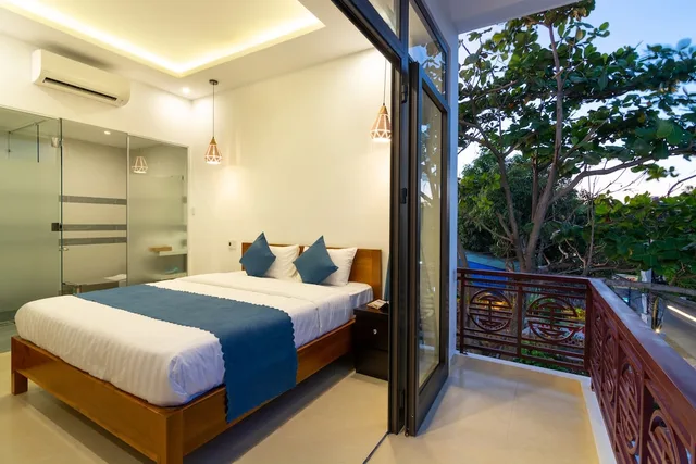 غرفة ديلوكس بسرير مزدوج أو سريرين منفصلين بشرفة، An Bang Scent Beach Homestay 9/10