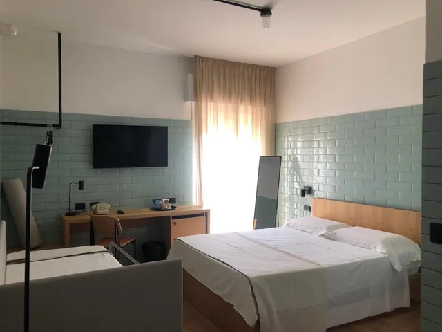 غرفة كومفورت ثلاثية، La Versiliana Hotel 1/8