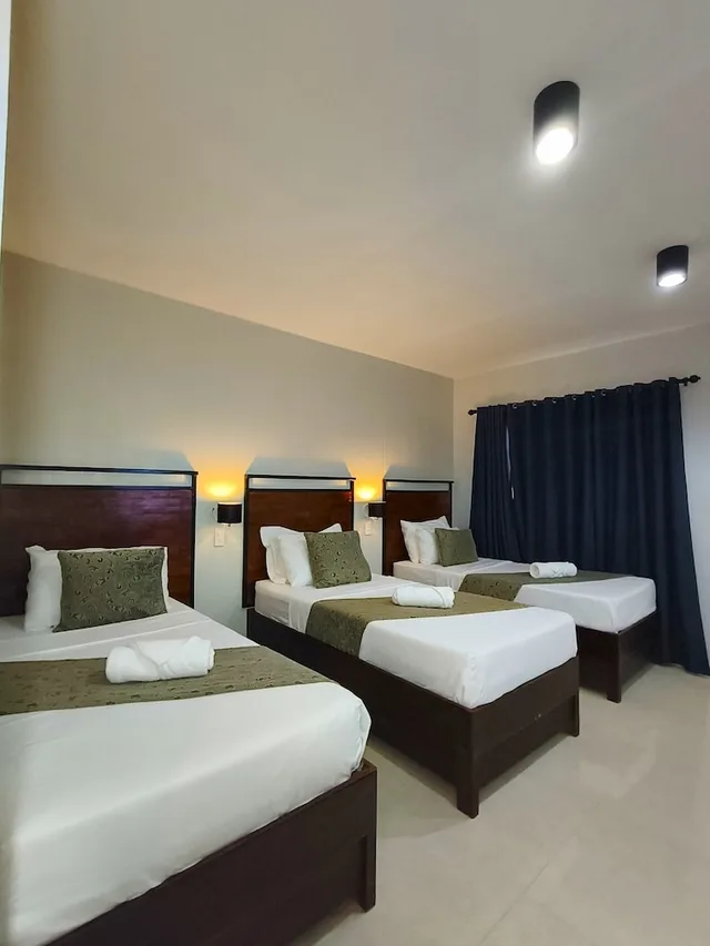 غرفة عائلية ثلاثية بسرير كوين وسرير فردي، Delle Suites 1/5