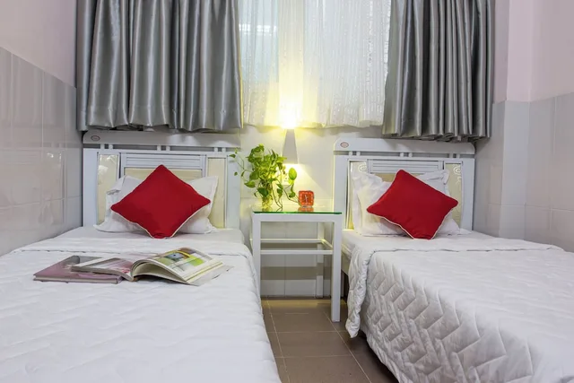 غرفة قياسية بسريرين منفصلين، Quang Guest House 4/10