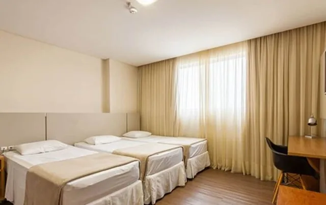 غرفة ديلوكس ثلاثية بسرير مزدوج وسرير فردي، Tri Hotel Executive Brusque 1/2