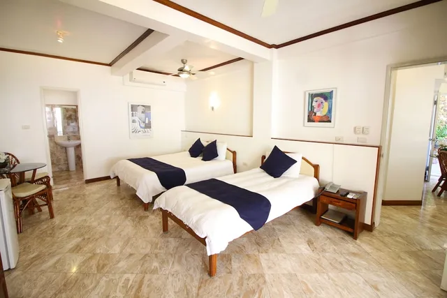 جناح ملكي بسرير كوين وسرير فردي، Mermaid Resort 1/3