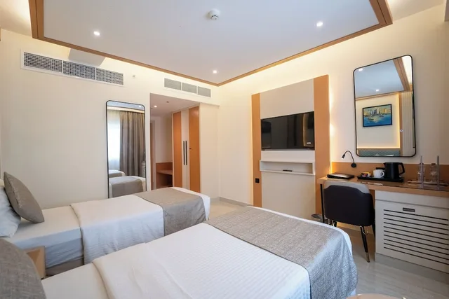 غرفة ديلوكس بسريرين منفصلين، Smana Hotel Al Raffa 1/5
