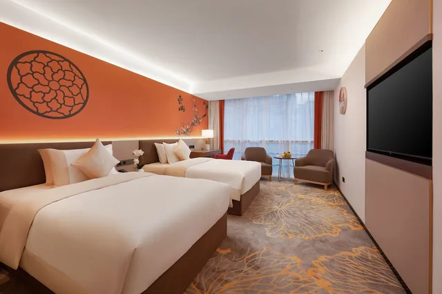 غرفة بريميوم بسريرين منفصلين، Guangzhou Wogo Yuanbao Hotel (Zhujiang New Town) 1/3