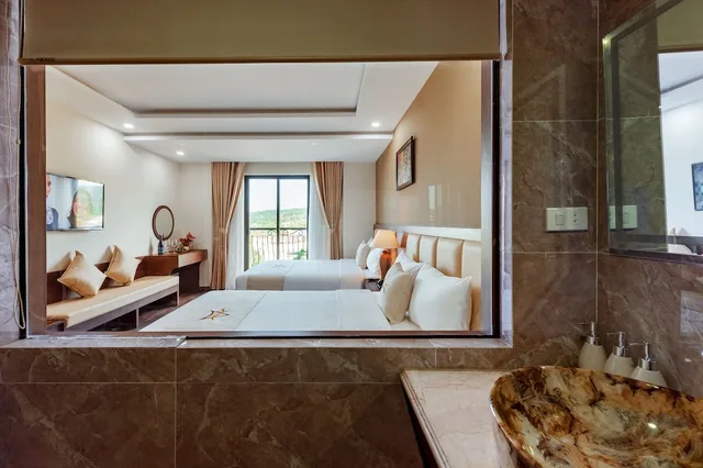 غرفة ديلوكس بسرير كوين وسرير فردي بإطلالة على الحديقة، Aquasun Hotel 7/7