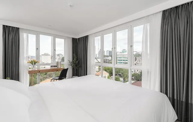 جناح دوبلكس عائلي بسريرين كوين، M Village Hotel Hai Ba Trung, a brand of Modern Village Lifestyle 2/3