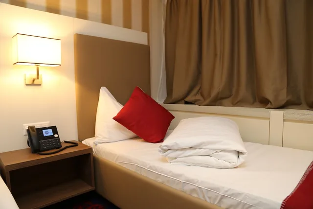 غرفة بشرفة مفردة بسرير فردي، My Home Hotel 1/2
