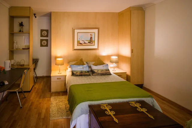غرفة ثلاثية بسرير مزدوج وسرير فردي، Homestead B & B 1/1
