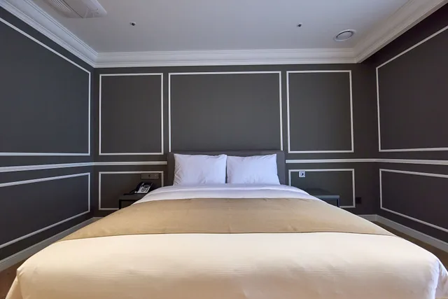 جناح ملكي بسريرين كينج وثلاثة أسرّة، Busan City Hotel 1/10