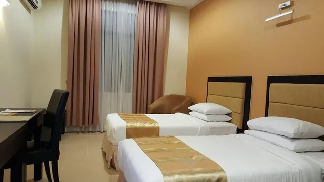 غرفة ديلوكس بسريرين منفصلين، Pantai Puteri Hotel Malacca 1/8