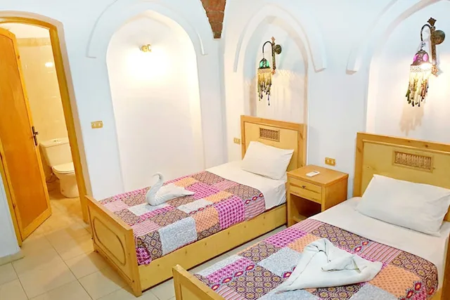 غرفة قياسية ثلاثية بثلاثة أسرّة بإطلالة على الحديقة بغرفة نوم واحدة، Hotel Sheherazade 1/3