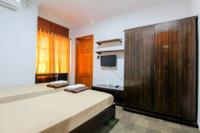 غرفة قياسية بسريرين منفصلين، Embe Enem Homestay by ZUZU 1/2