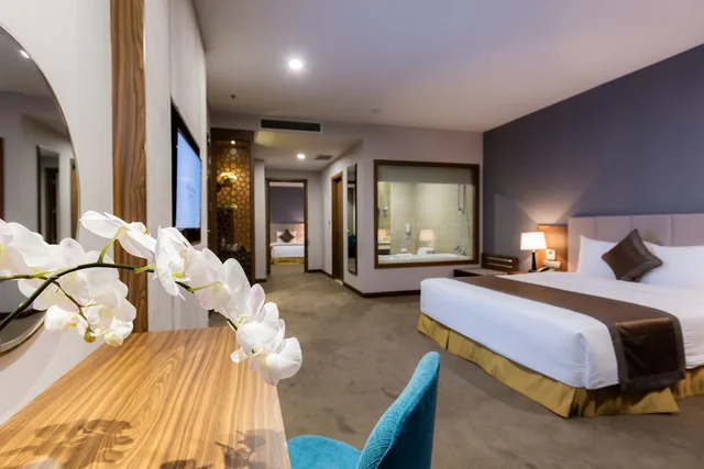 غرفة عائلية بسريرين منفصلين وسرير كينج، Muong Thanh Luxury Vien Trieu Hotel 1/6