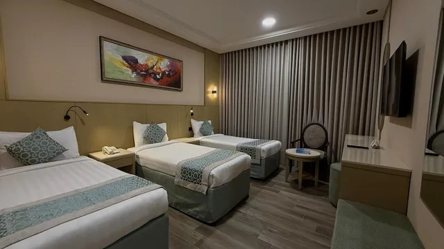 Connecting, 1 Double and 3 Single Beds، فندق عفراء(Afraa Hotel) 3/10