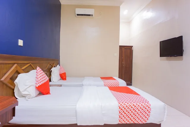 غرفة ديلوكس بسريرين منفصلين، OYO 1636 Wisma Kuta Karang 3/7