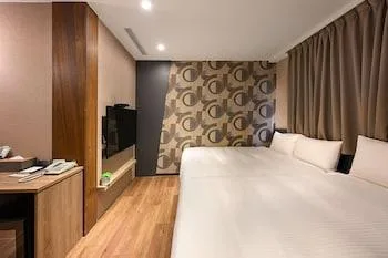 غرفة ديلوكس رباعية بغرفة نوم واحدة لذوي الإعاقة، Ximen Hedo Hotel Kangding Taipei 1/2