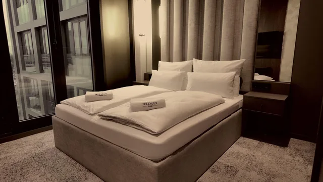 غرفة بسرير كوين، Bellman Hotel 1/8