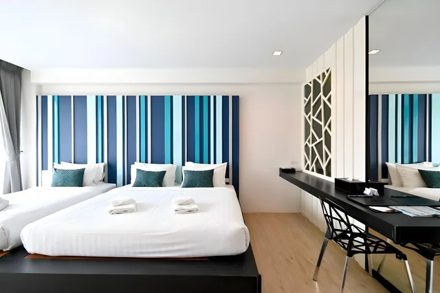 غرفة ديلوكس ثلاثية بسرير مزدوج بشرفة بغرفة نوم واحدة، Att Boutique Hotel 1/1
