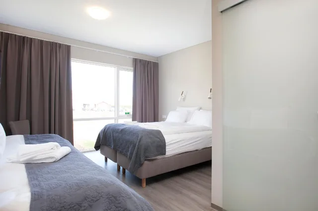 غرفة كومفورت ثلاثية بسرير مزدوج وسرير فردي، Arnarstapi Hotel 1/2