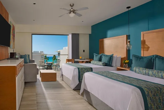 جناح جونيور بسريرين كوين بإطلالة على البحر، Dreams Cozumel Cape Resort & Spa 1/3