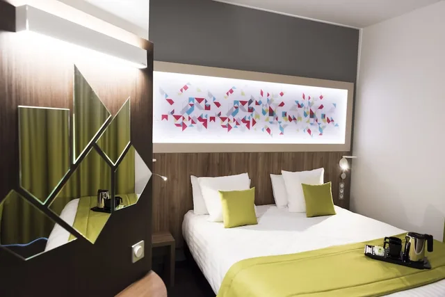 غرفة بسرير كينج، Brit Hotel Figeac 4/8