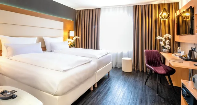 غرفة كومفورت مفردة بسريرين منفصلين، PLAZA INN Heilbronn 1/10