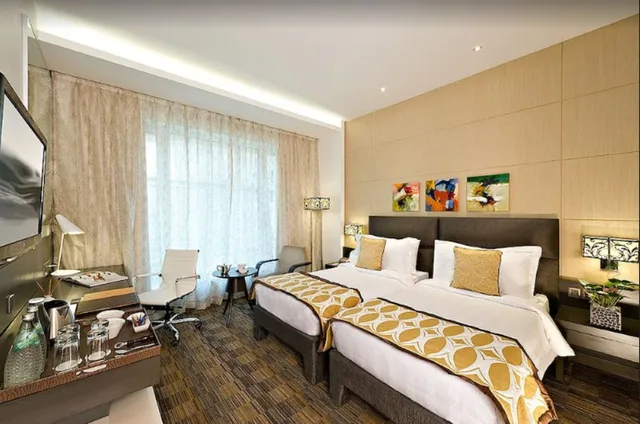 Winter Green Room، Meluha the Fern An Ecotel Hotel 1/7