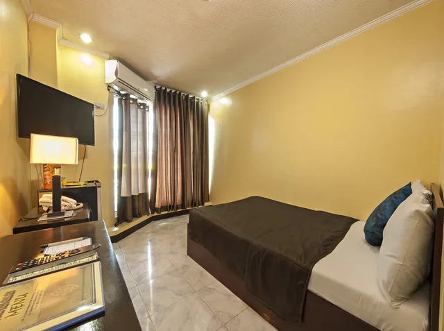 غرفة ديلوكس بسرير كينج، Oyster Plaza Hotel 4/4