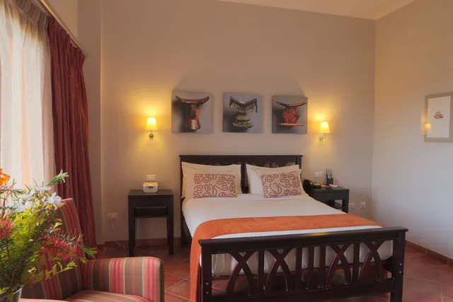 غرفة بسريرين منفصلين بإطلالة على الحديقة، Haile Resort Hawassa 4/9