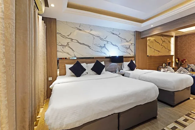 جناح تنفيذي بسرير كينج وسرير فردي، OYO 338 Transworld Hotel 2/5