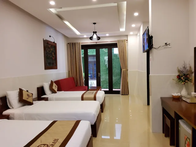 غرفة ديلوكس عائلية بسرير مزدوج وسريرين منفصلين بشرفة، Bean Grass Homestay 1/7