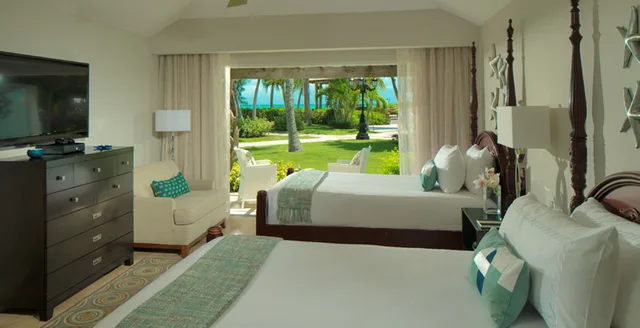 2 Bedrooms, Luxury, Suite, 2 Double Beds, Partial Ocean View, Butler، Beaches Turks & Caicos 1/5