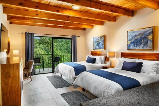 غرفة بسريرين مزدوجين، Bosque Escondido Hotel de Montana 1/6