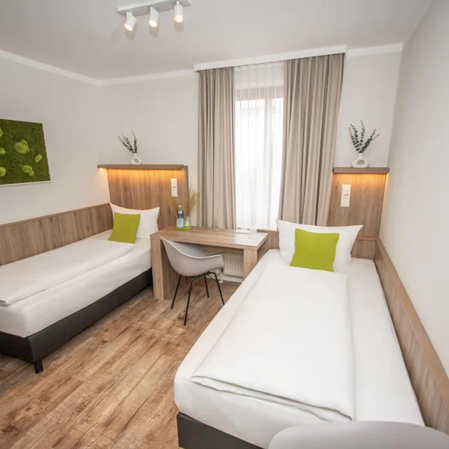 غرفة بسريرين منفصلين، GOLDEN LEAF PERLACH ALLEE HOF 4/10