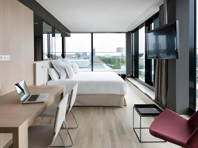 جناح جونيور بسرير كينج مع أريكة، Barcelo Hamburg 2/2