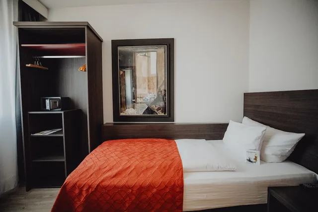 غرفة كلاسيكية مفردة بسرير فردي، art & business hotel Nurnberg 3/8