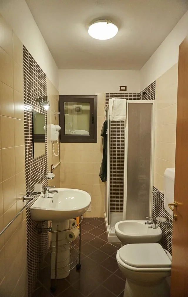 غرفة كومفورت بسرير كوين، B&B Villa Rosaria 5/6